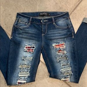 Distressed skinny jean with flannel detail